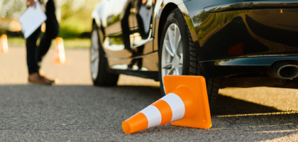 Car parked beside a traffic cone during a manoeuvre exercise